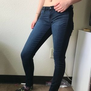 split color dark wash denim jeans